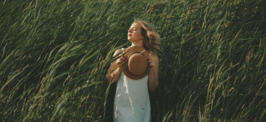 woman in tall grass